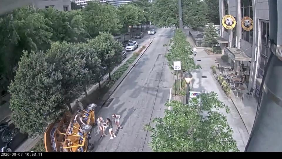 Surveillance video provided by the Atlanta Police Department shows the moments after a pedal pub crash in Atlanta on April 30.