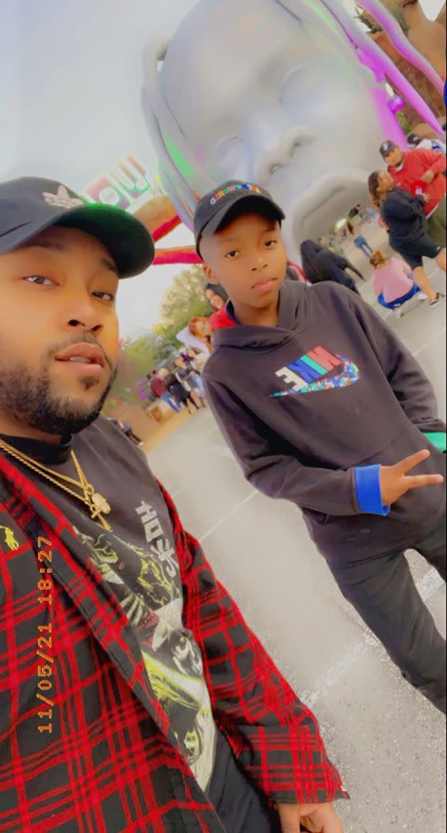 This photo provided by Taylor Blount shows Ezra Blount, right, and his father, Treston Blount, left, posing outside the Astroworld music festival in Houston. Both were injured later at the concert during a crowd surge. (Courtesy of Taylor Blount via AP) (Photo: via Associated Press)