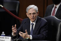 Judge Merrick Garland, President Joe Biden's pick to be attorney general, answers questions from Sen. John Kennedy, R-La., as he appears before the Senate Judiciary Committee for his confirmation hearing, on Capitol Hill in Washington, Monday, Feb. 22, 2021. (AP Photo/J. Scott Applewhite)