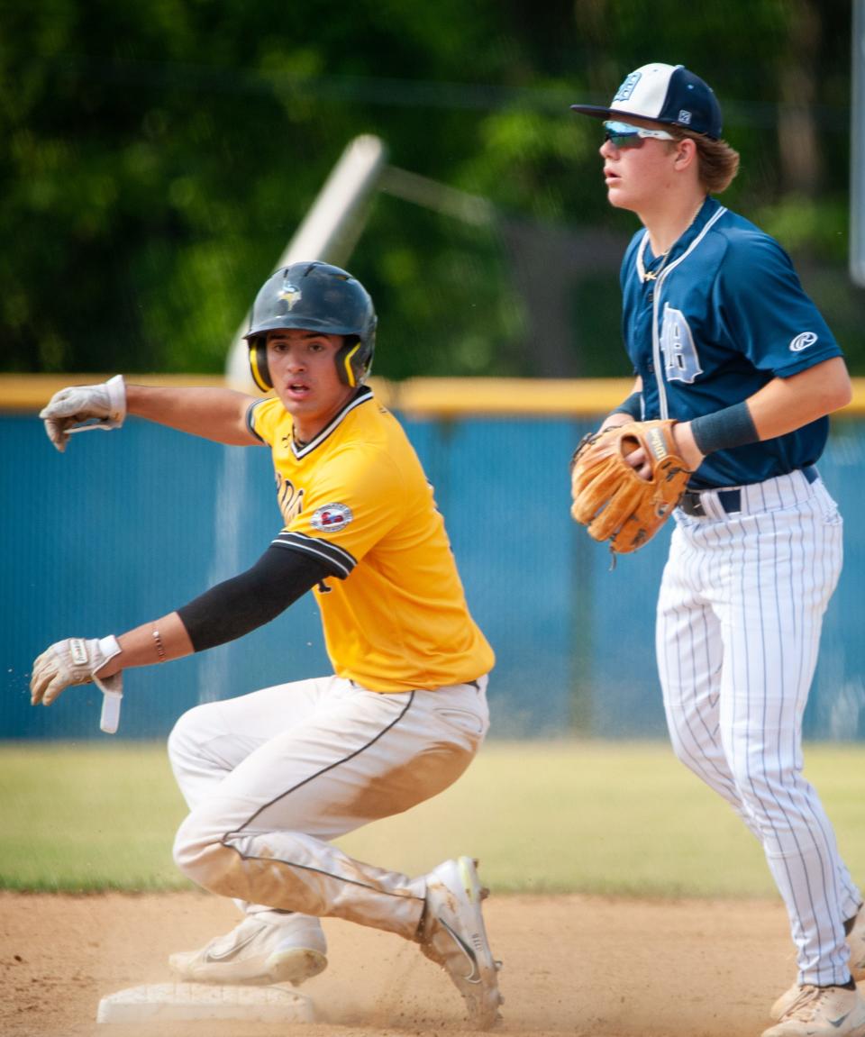 Archbishop Wood's Joey Gale bounces up after being forced out at second base during a PIAA Class 4A state semifinal game against Dallas.