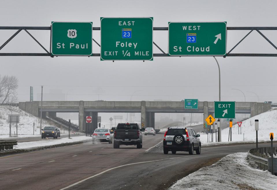 Traffic moves through the intersection of Highways 10 and 23 Thursday, Jan. 7, 2021, in St. Cloud.   