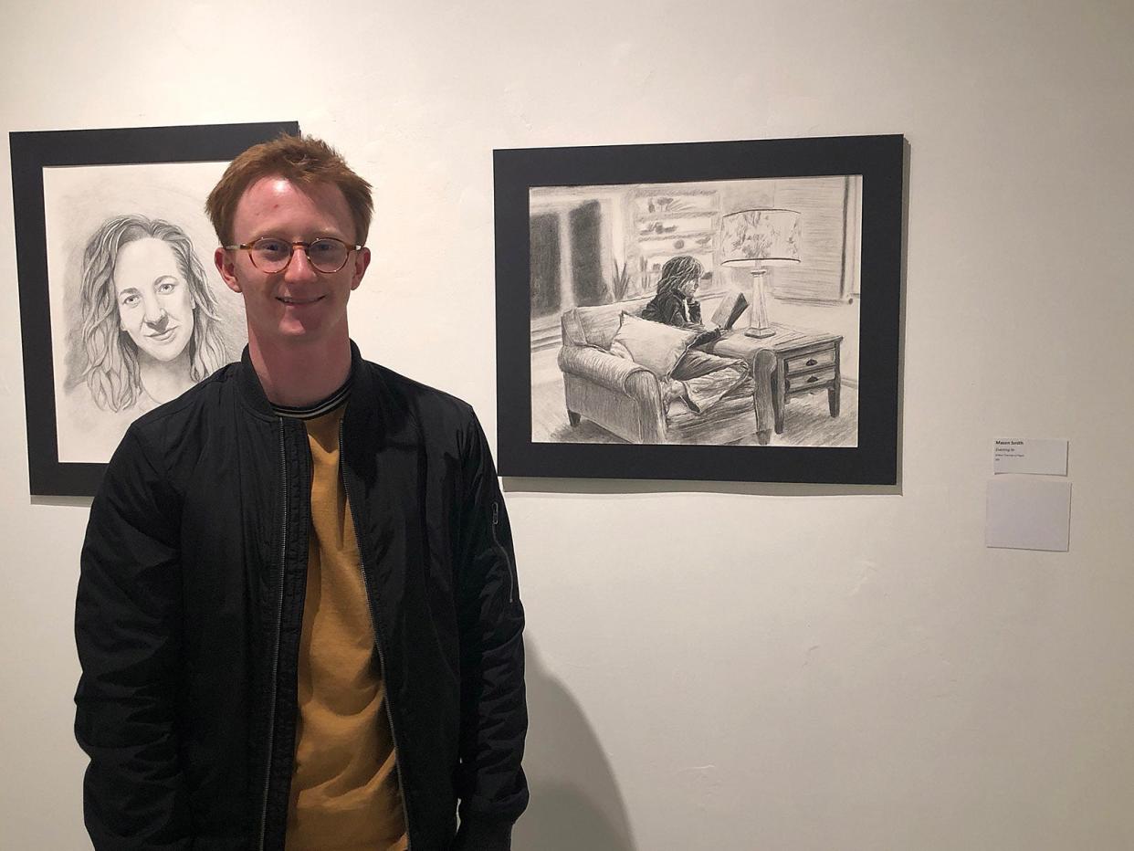 The Best in Show winner us Mason Smith of Ashland with “Evening In,” a drawing with willow charcoal on paper.