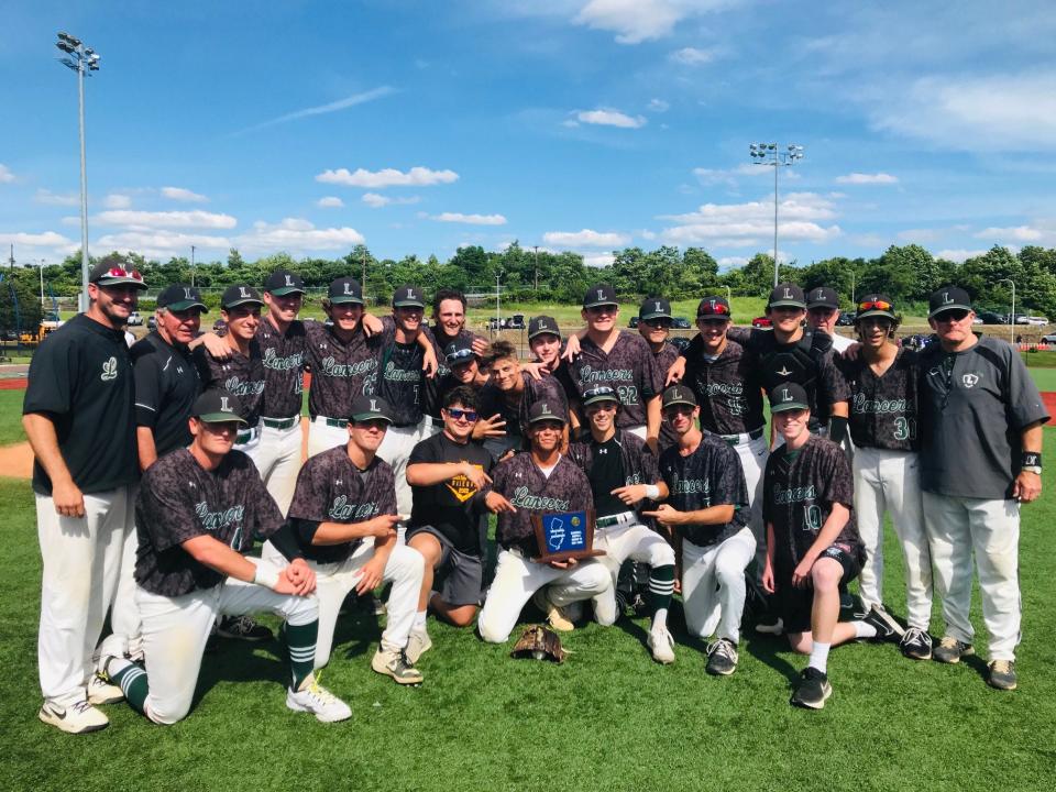 Livingston celebrates with the trophy after beating Passaic Tech, 4-2, in the North 1, Group 4 championship game.