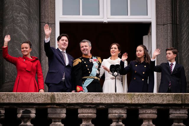 <p>BO AMSTRUP/Ritzau Scanpix/AFP via Getty</p> Princess Isabella of Denmark, Prince Christian of Denmark, King Frederik X of Denmark, Queen Mary of Denmark, Princess Josephine of Denmark and Prince Vincent of Denmark wave to the crowd after a declaration of the King's accession to the throne at Christiansborg Palace on Jan. 14.