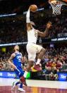 Nov 17, 2017; Cleveland, OH, USA; Cleveland Cavaliers forward LeBron James (23) dunks the ball past Los Angeles Clippers guard Austin Rivers (25) during the fourth quarter at Quicken Loans Arena. Mandatory Credit: Scott R. Galvin-USA TODAY Sports