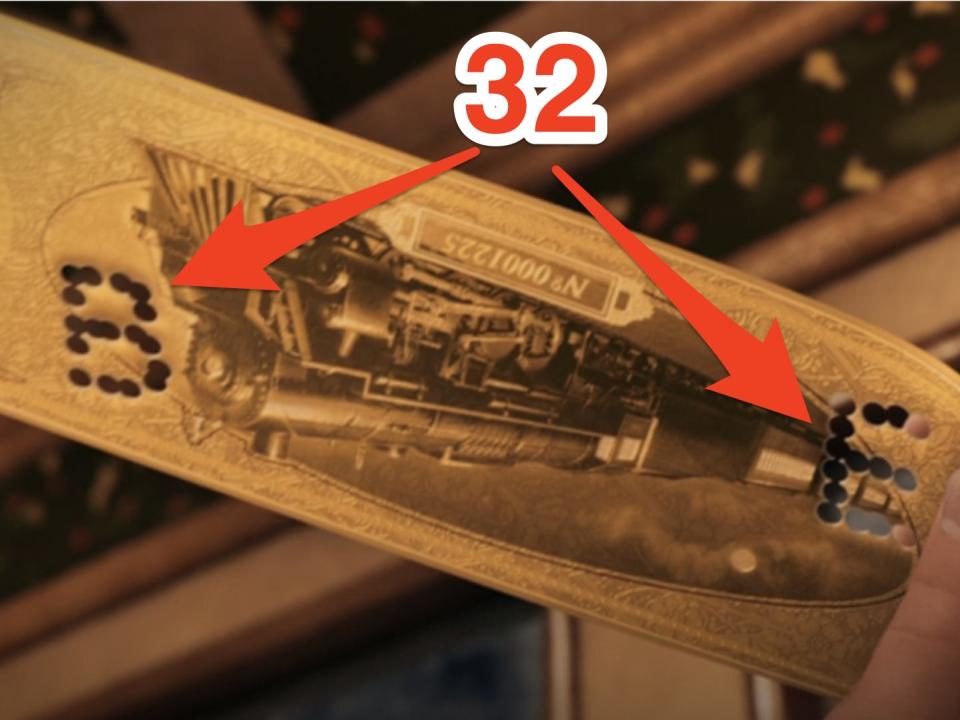 train ticket from the polar express with letters B and E punched into it, red arrows pointing to letter indicating 32 punches