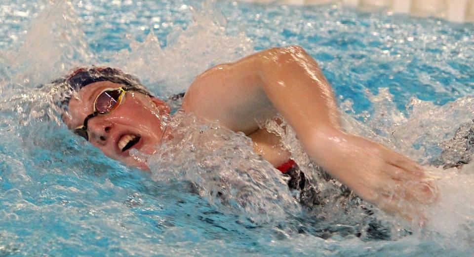 BNL junior Shelby Slaughter swims the freestyle leg on the 200 medley relay for the Stars.