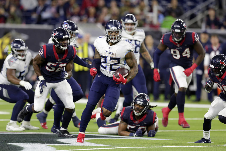 Tennessee Titans running back Derrick Henry (22) breaks away for a 53-yard touchdown run during the second half of an NFL football game Sunday, Dec. 29, 2019, in Houston. The run moved Henry into first place for the season rushing title. The Titans won 35-14. (AP Photo/Michael Wyke)