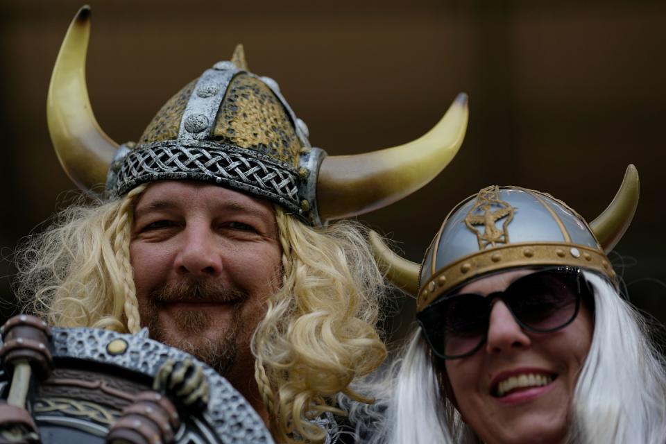 Fans of Denmark pose ahead of the World Cup group D soccer match between Denmark and Tunisia, at the Education City Stadium in Al Rayyan, Qatar, Tuesday, Nov. 22, 2022. (AP Photo/Ariel Schalit)