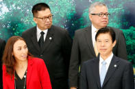 Trade ministers pose for a group photo during the APEC Ministers Responsible For Trade (APEC MRT 23) meeting in Hanoi, Vietnam May 20, 2017. From L-R, front: Chile's Vice Minister of Trade Paulina Aranda and China's Commerce Minister Zhong Shan. From L-R, back: Thailand's Vice Minister of Commerce Winichai Chaemchaeng and Philippines' Trade Secretary Ramon Lopez. REUTERS/Kham
