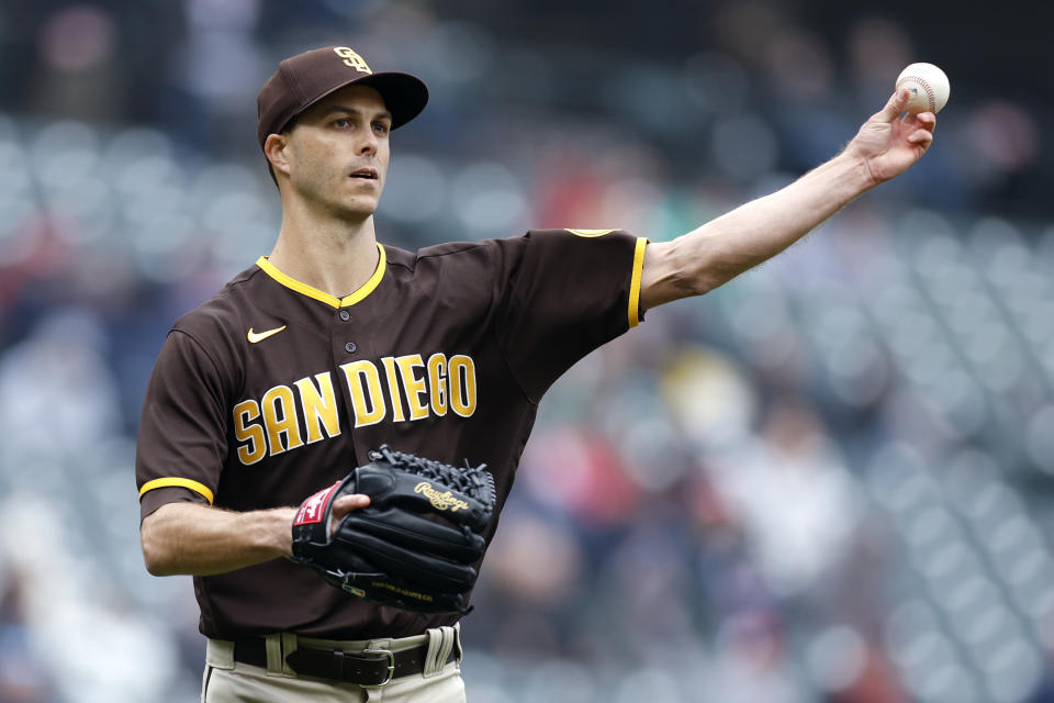 San Diego Padres relief pitcher Taylor Rogers throws out Cleveland Guardians' José Ramírez at first base during the ninth inning in the first baseball game of a doubleheader, Wednesday, May 4, 2022, in Cleveland. (AP Photo/Ron Schwane)