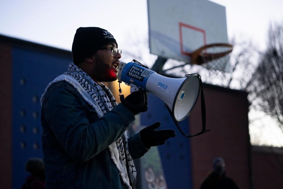 Ramon Obey, Executive Director of JUST (Justice, Unity and Social Transformation) speaks to the crowd during a gathering at the basketball courts at Thompson Park. The organization was one of a few that led a march following a Friday mistrial of the former Franklin County Sheriff's deputy accused if killing Casey Goodson Jr. in 2020.