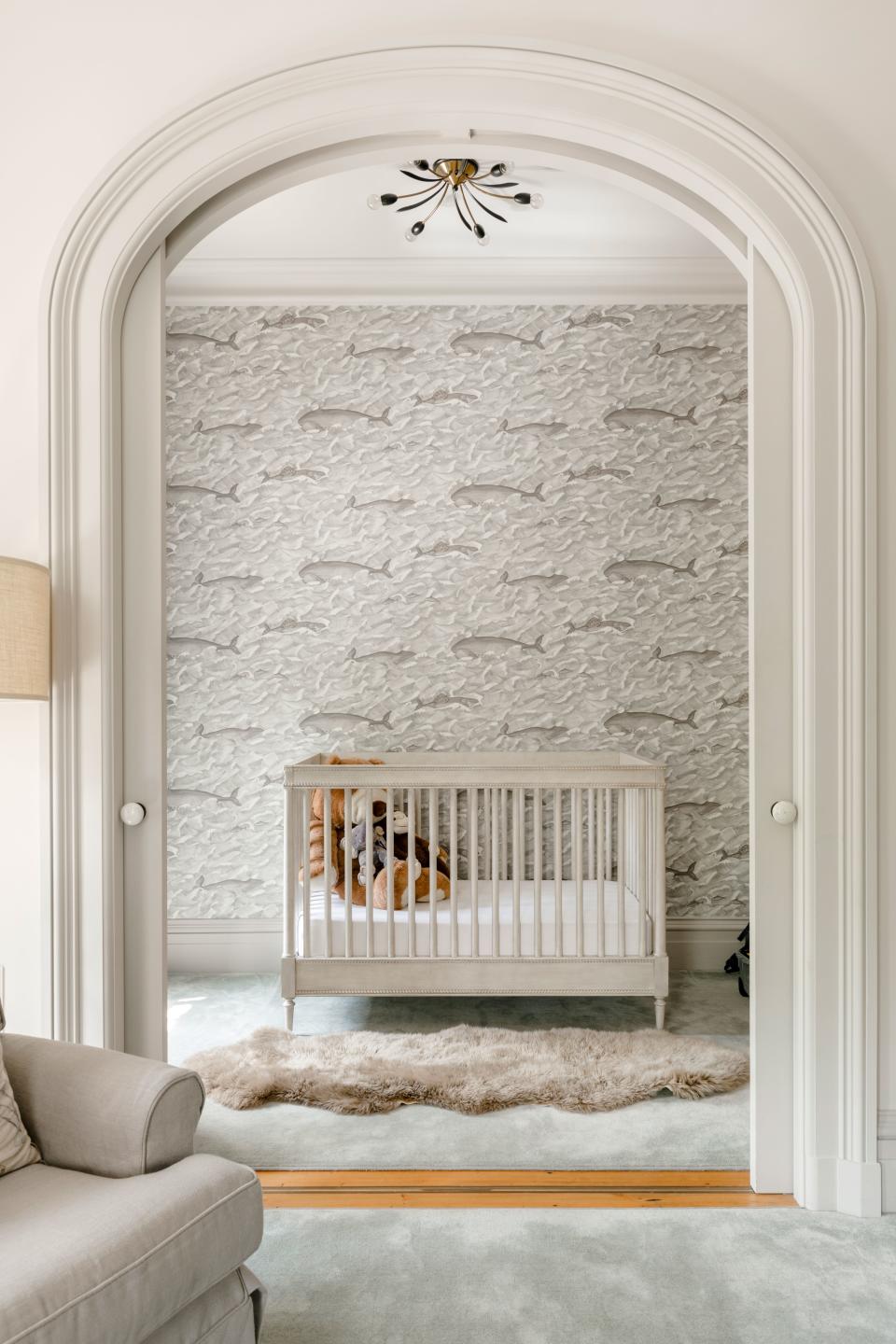 This nursery was designed for her son Sailor, who is now four years old. “We moved [to London] when Lula was only six weeks, so she was still in her little bassinet,” says Tyler. “Now they both kind of use this room, depending on the trip, and who is traveling with me. Sometimes Sailor will still sleep in the crib, and sometimes [Lula] sleeps in the bed with me.” The whale of a wallpaper is the Melville pattern in black and white, from Cole & Son’s Whimsical collection.