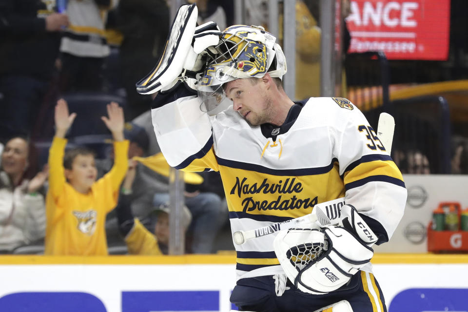 Nashville Predators goaltender Pekka Rinne, of Finland, skates back to the net during the third period of the team's NHL hockey game against the St. Louis Blues on Sunday, Feb. 16, 2020, in Nashville, Tenn. The Predators won 2-1. (AP Photo/Mark Humphrey)