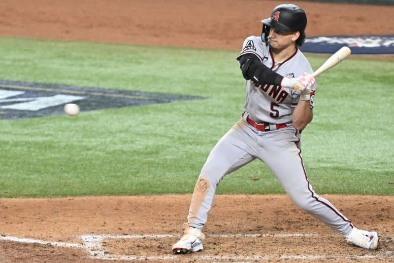 Arizona Diamondbacks outfielder Alek Thomas hits a double in the seventh inning against the Texas Rangers in Game 2 of the 2023 World Series on Saturday at Globe Life Field in Arlington, Texas. Photo by Ian Halperin/UPI