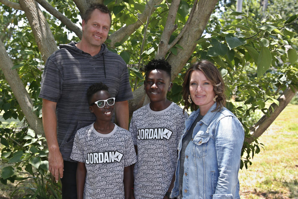 The Porter family is pictured outside their church Friday, June 12, 2020, in Newcastle, Okla. From left are Matt, Paul, Timothy and Julie. The family lives in a small, mostly white town. (AP Photo/Sue Ogrocki)