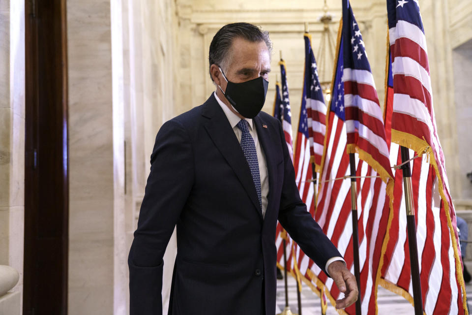 Sen. Mitt Romney, R-Utah, departs after the Republican Conference held leadership elections, on Capitol Hill in Washington, Tuesday, Nov. 10, 2020. (AP Photo/J. Scott Applewhite)