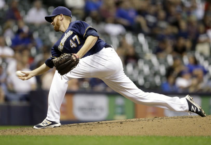Milwaukee Brewers pitcher Ben Rowen delivers to the Pittsburgh Pirates during the fifth inning of a baseball game Tuesday, Sept. 20, 2016, in Milwaukee. (AP Photo/Jeffrey Phelps)