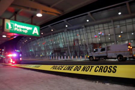 Police tape block the arrivals area of Terminal 4 following a water main break that closed a part of the terminal at John F. Kennedy International Airport in New York City, U.S. January 7, 2018. REUTERS/Andrew Kelly