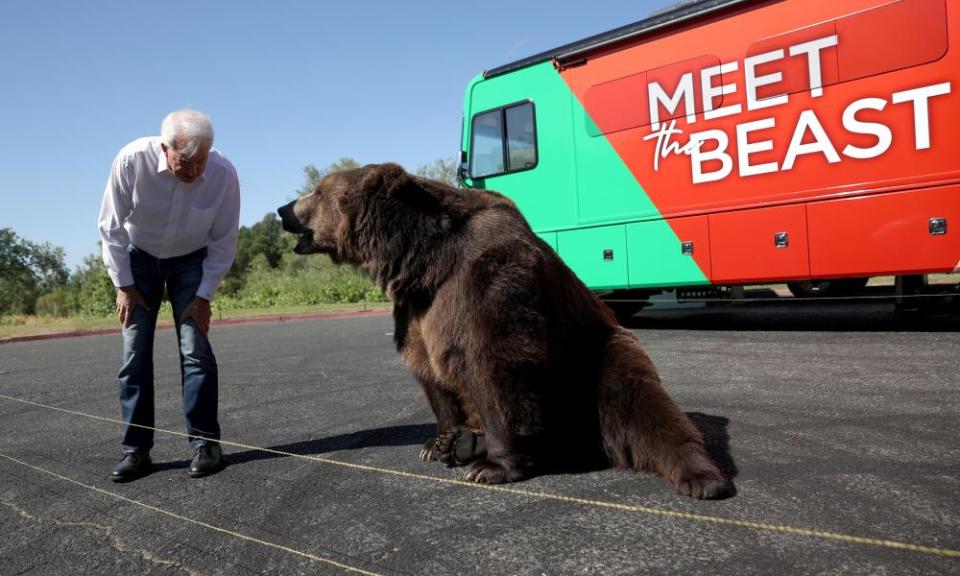 John Cox greets a bear.