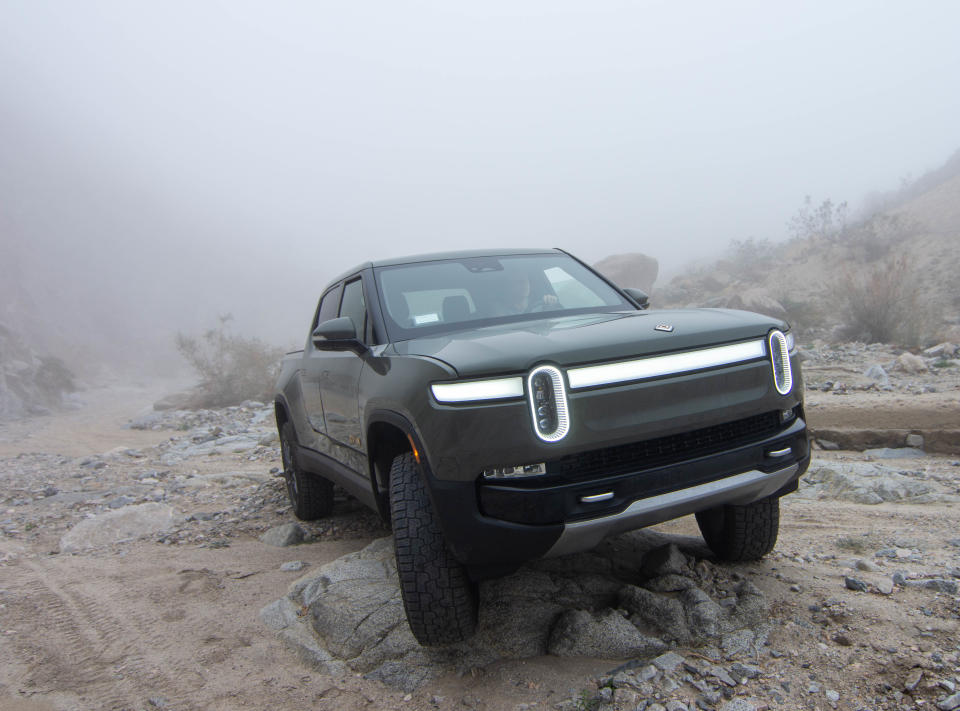 A Rivian truck has multiple suspension heights to climb over large obstacles in Fargo Canyon near Indio, Calif., on Dec. 31, 2022.