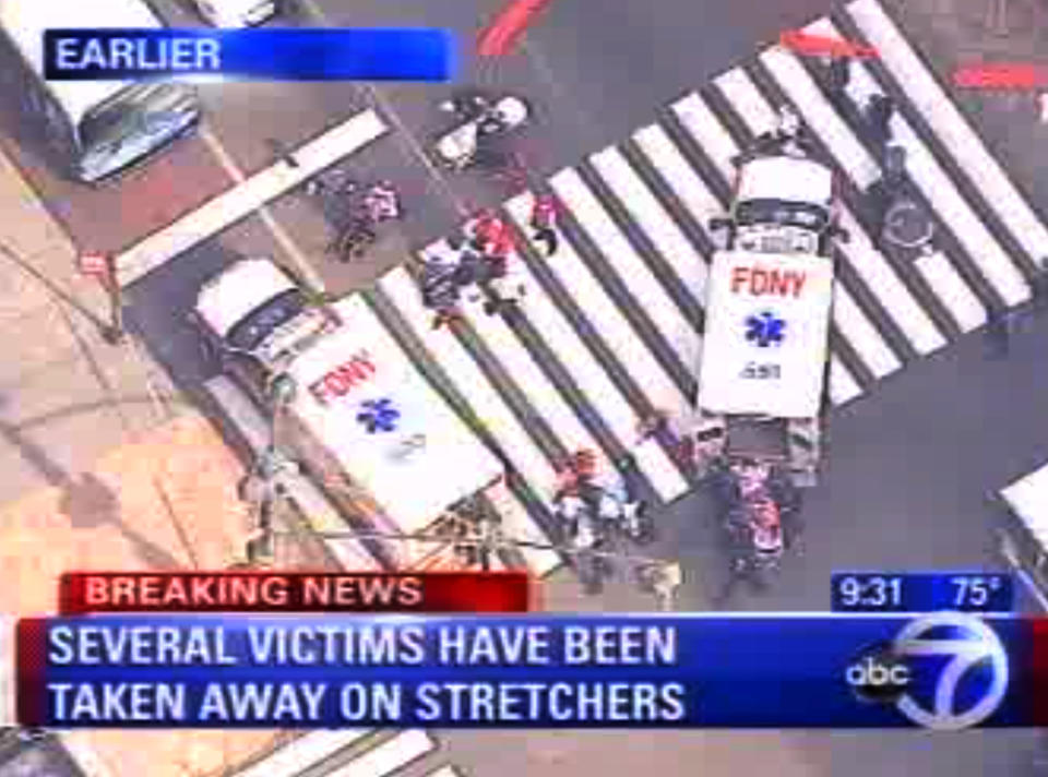 In this frame grab from WABC-TV, emergency personnel respond to reports of several people being shot outside the Empire State Building, Friday, Aug. 24, 2012, in New York. Authorities say the shooter is dead. (AP Photo/WABC-TV) MANDATORY CREDIT