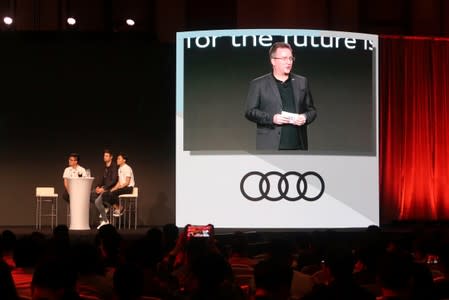 Screen shows Audi China President Thomas Owsianski at the CES Asia in Shanghai