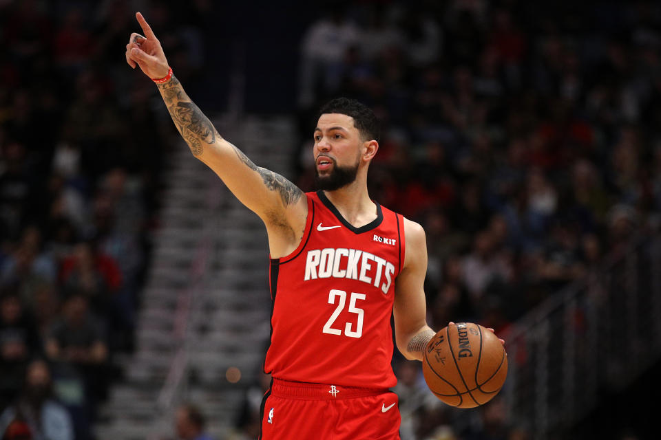 After stealing a rebound from James Harden on Tuesday night, Austin Rivers instantly felt terrible. (Chris Graythen/Getty Images)