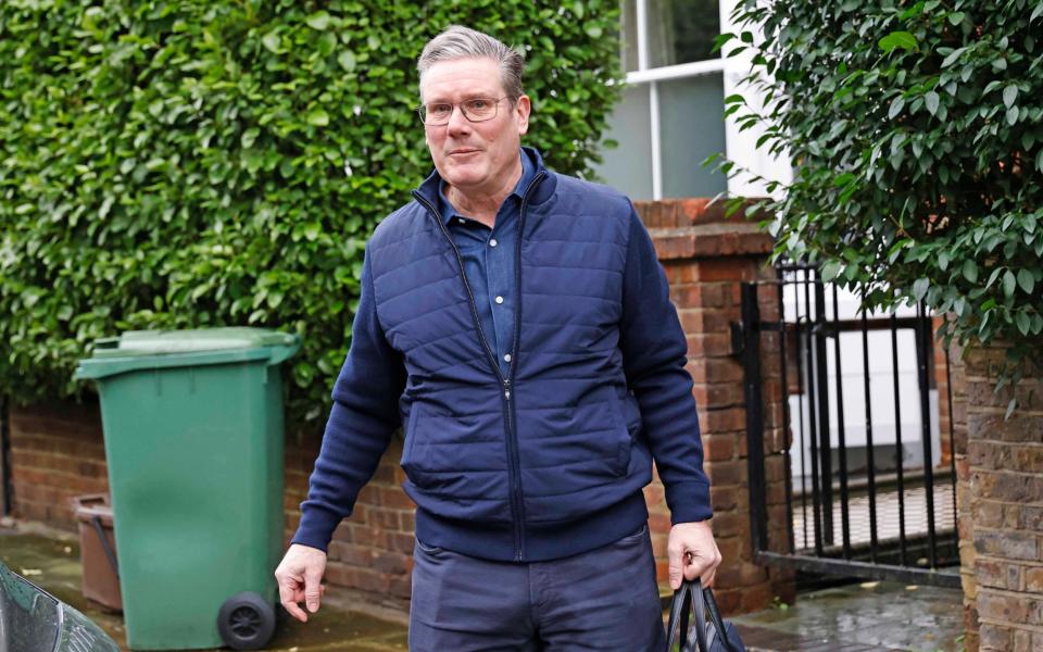 Sir Keir Starmer, the Labour leader, is pictured today leaving his London home