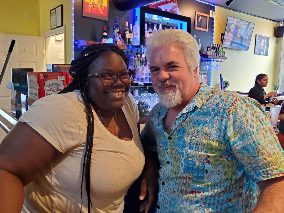 Julite Gordon and Craig Tourtelotte of South Berwick, Maine, said they are dedicated customers of Flame, the new Jamaican restaurant in Somersworth.