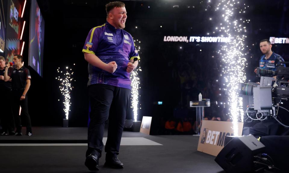 <span>Luke Littler celebrates beating Luke Humphries in the final of the Premier League Darts final at the O2 Arena.</span><span>Photograph: Tom Jenkins/The Guardian</span>