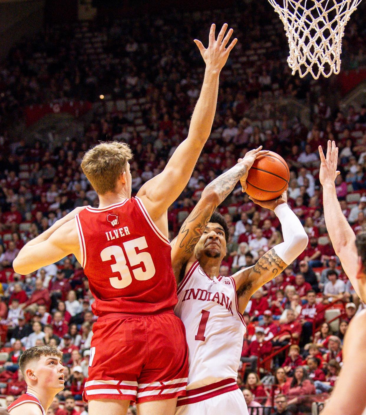 Indiana's Kel'el Ware (1) scores past Wisconsin's Markus Ilver (35) during the first half of the Indiana versus Wisconsin men's basketball game at Simon Skjodt Assembly Hall on Tuesday, Feb. 27, 2024.