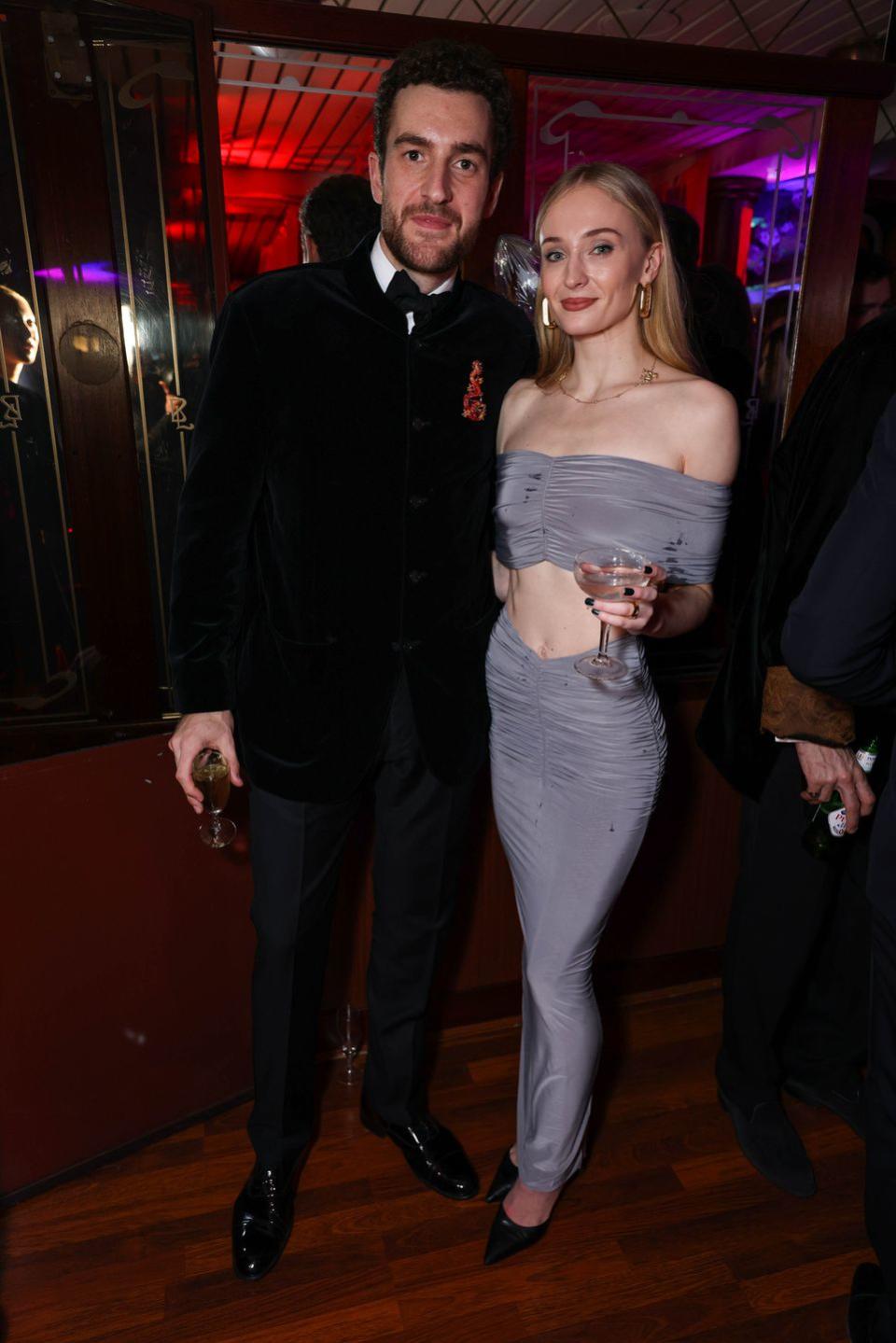 sophie turner and peregrine pearson at stanley zhu's year of dragon celebration