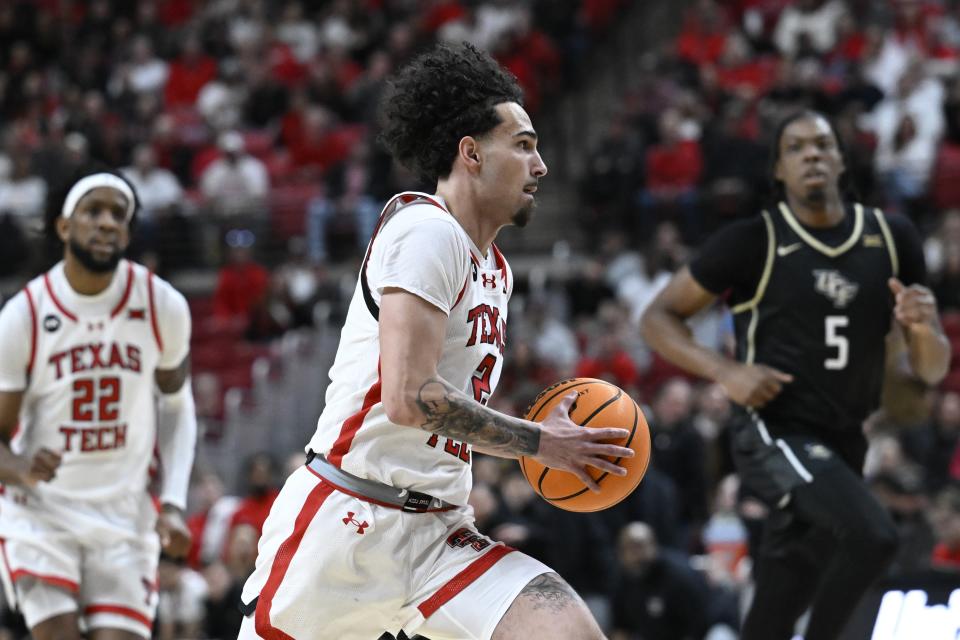 Texas Tech guard Pop Isaacs drives to the basket against Central Florida during the first half of an NCAA college basketball game, Saturday, Feb. 10, 2024, in Lubbock, Texas. (AP Photo/Justin Rex)