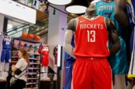 Customers shop in the NBA Store in New York