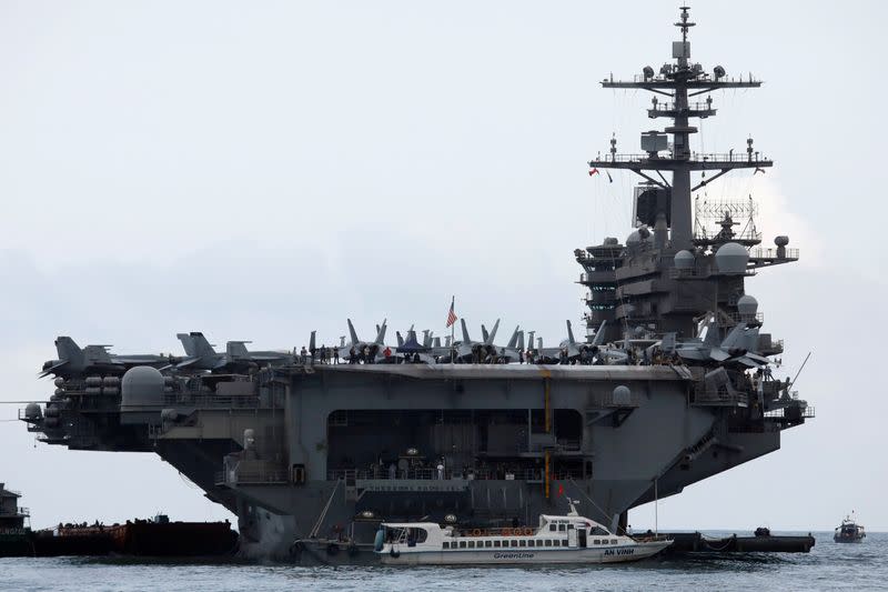 FILE PHOTO: The USS Theodore Roosevelt (CVN-71) is seen while entering into the port in Da Nang, Vietnam