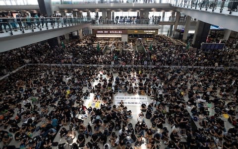 Hong Kong international airport - Credit: Vincent Thian/AP