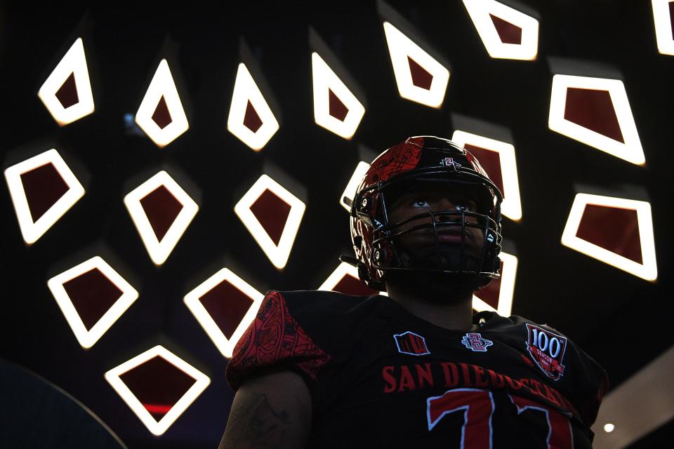 Sep 24, 2022; San Diego, California, USA; San Diego State Aztecs offensive lineman Josh Simmons (77) looks on before the game against the Toledo Rockets at Snapdragon Stadium. Mandatory Credit: Orlando Ramirez-USA TODAY Sports