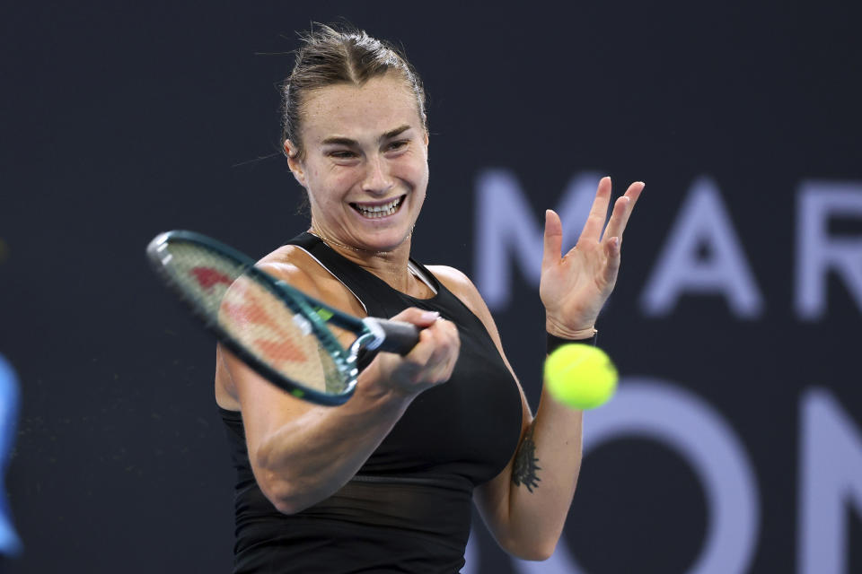 Aryna Sabalenka of Belarus plays a shot in her final match against Elena Rybakina of Kazakhstan during the Brisbane International tennis tournament in Brisbane, Australia, Sunday, Jan. 7, 2024. (AP Photo/Tertius Pickard)