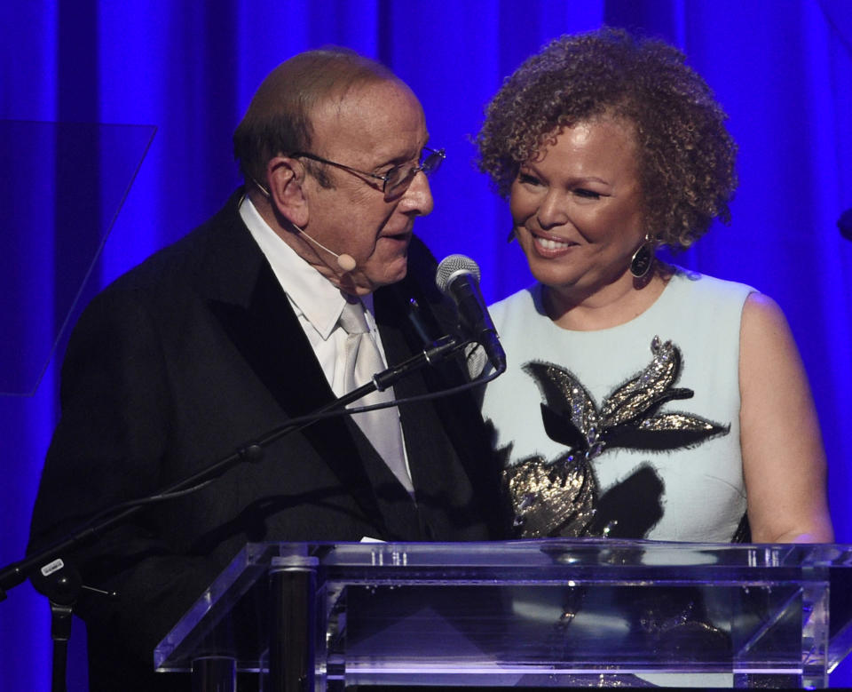 Clive Davis, left, honors Debra L. Lee, BET Network chairman/CEO, as the GRAMMY Salute To Industry Icon at the Clive Davis and The Recording Academy Pre-Grammy Gala at the Beverly Hilton Hotel on Saturday, Feb. 11, 2017, in Beverly Hills, Calif. (Photo by Chris Pizzello/Invision/AP)