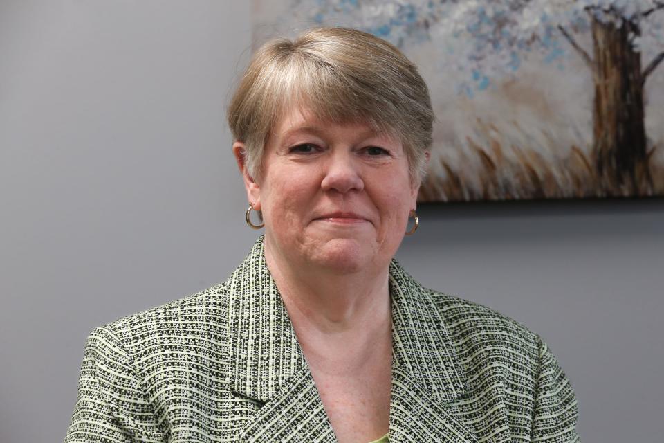 Frances Wilson, president and CEO of The Purple Door, poses inside her office Thursday, Feb. 22, 2024.