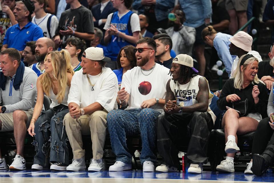 DALLAS, TX - MAY 26: Brittany Mahomes, Patrick Mahomes, Travis Kelce, and Marquise Brown sit court side during the game between the Minnesota Timberwolves and the Dallas Mavericks during Game 3 of the Western Conference Finals of the 2024 NBA Playoffs on May 26, 2024 at the American Airlines Center in Dallas, Texas. NOTE TO USER: User expressly acknowledges and agrees that, by downloading and or using this photograph, User is consenting to the terms and conditions of the Getty Images License Agreement. Mandatory Copyright Notice: Copyright 2024 NBAE (Photo by Glenn James/NBAE via Getty Images)