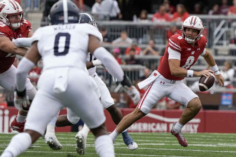 Wisconsin's Tanner Mordecai runs during the first half of an NCAA college football game against Georgia Southern Saturday, Sept. 16, 2023, in Madison, Wis. (AP Photo/Morry Gash)