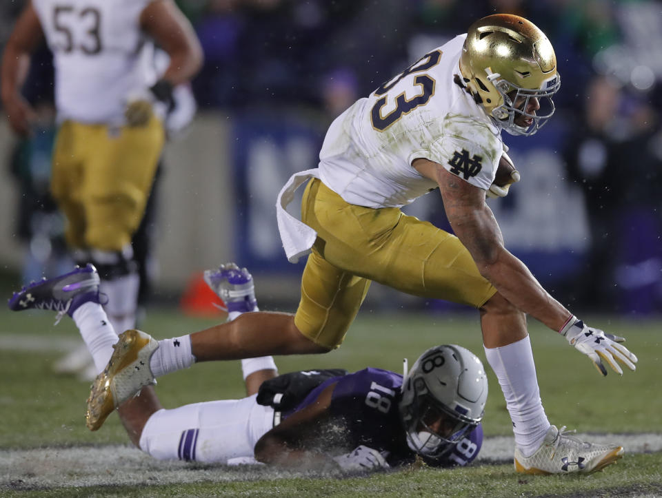 Notre Dame's Chase Claypool, top, breaks away from Northwestern's Cameron Ruiz during the second half of an NCAA college football game Saturday, Nov. 3, 2018, in Evanston, Ill. (AP Photo/Jim Young)