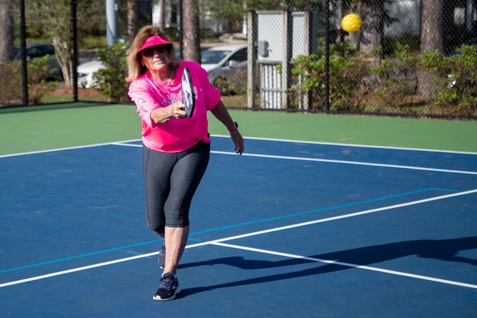Susan Chase plays pickleball with her friends at Winthrop Park on Friday, March 31, 2023. 