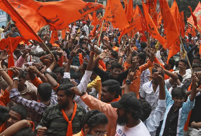 Hindus participate in a religious procession to mark the Hanuman Jayanti festival in Hyderabad, India, Saturday, April 16, 2022. India’s hardline Hindu nationalists have long espoused an anti-Muslim stance, but attacks against the minority community have recently occurred more frequently. In many cases, hate-filled and provocative songs that are blared through speakers during Hindu festivals have become a precursor to this violence. (AP Photo/Mahesh Kumar A.)