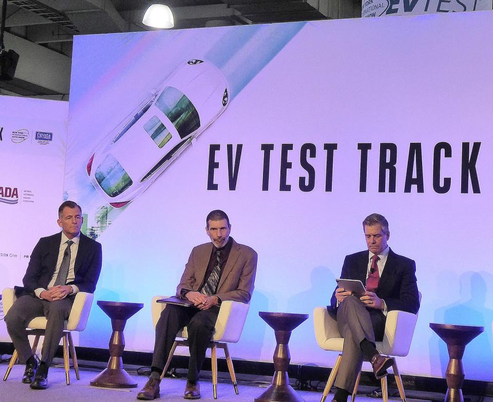 mike stanton sitting on stool at nyias 2024 ev panel