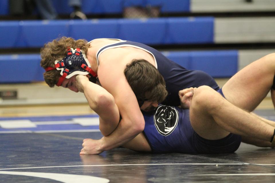 Lourdes' Matt Krauza (top) on his way to pinning Edgemont's Alex Michelson in the 189-pound match.