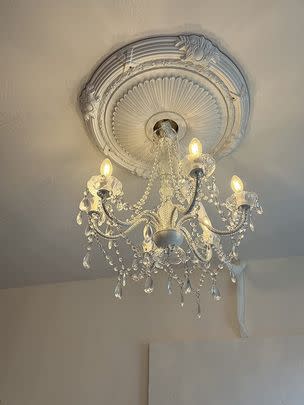 A ceiling medallion for a home upgrade that looks incredibly high-end for relatively little effort