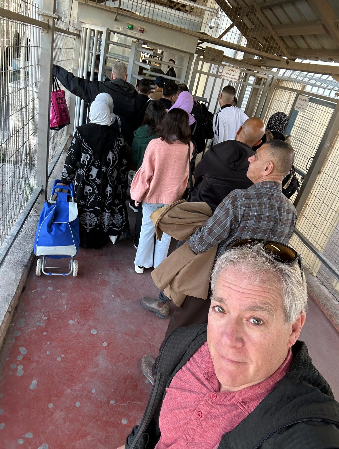 Mark Patinkin returns to Israel from the West Bank through a border checkpoint.